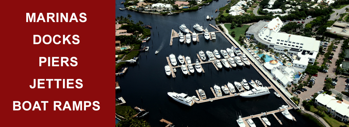 aerial view of a marina with several boats docked. Text "Marinas Docks Piers Jetties Boat Ramps"
